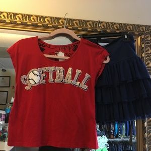 softball t-shirt with blue skirt